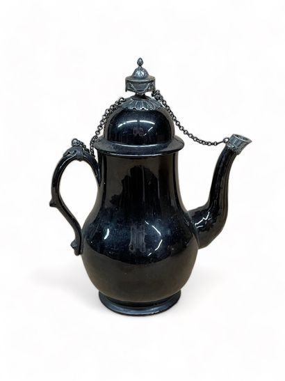 null Namur black earthenware coffee pot with chased silver mounting; the lid has...