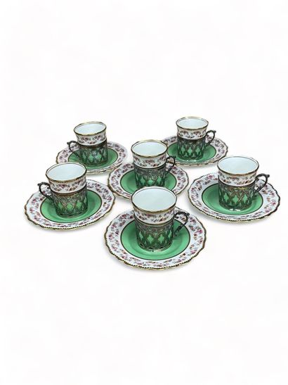 null Six Aynsley porcelain goblets and six saucers with silver cup mounts
Weight...