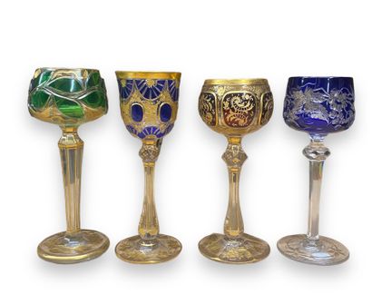 null Set of eight Rhine wine glasses in colored crystal, some with gold highlights...