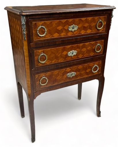 null Small chest of drawers with inlaid cubes and three drawers in the front.
Transition...