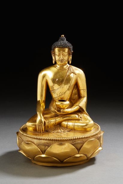 null Chine, XXe siècle
Sujet en bronze doré représentant le Bouddha Shakyamuni, assis...