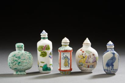 null China, 20th century, 
Lot comprising five snuff bottles, four of them in porcelain...