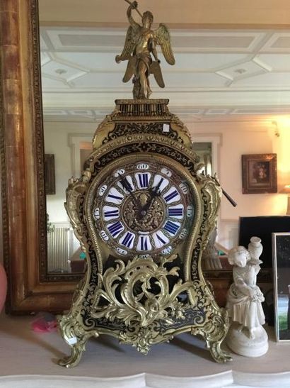 null Cartel de style Louis XIV en marqueterie "Boulle". 

H.: 78 cm.