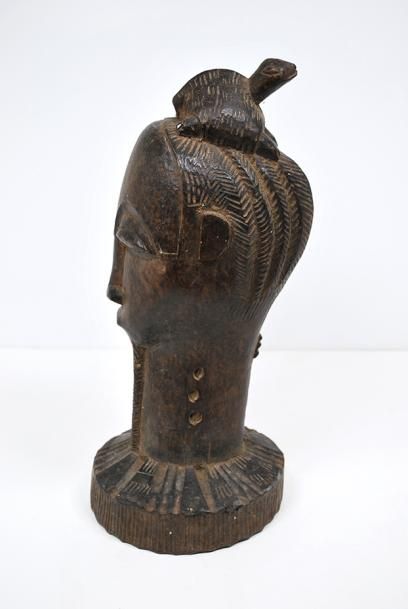 null Statue en bois d'un homme dont la tête est surmontée d'une tortue.

H. 34 c...