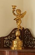 null Pied de lampe en bronze ciselé et doré formé d'un angelot du XIXe siècle portant...