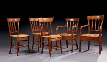 null Ensemble de dix chaises et quatre fauteuils paillés.
Epoque début XIXe siècle.
On...