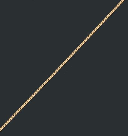 null Chaîne en or jaune 18K (750), maille serpent.
Long.: 41 cm
Poids: 14,40 g