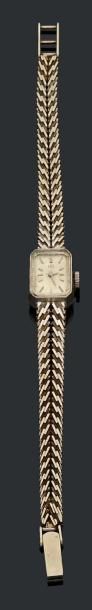 UTI Montre de femme à bracelet maillé en or blanc.
Vers 1960/70
Poids: 26,7 g