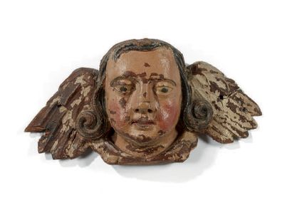 null Tête d'ange en chêne sculpté et polychrome.
Normandie, XVIIIe siècle.
H: 15,5...