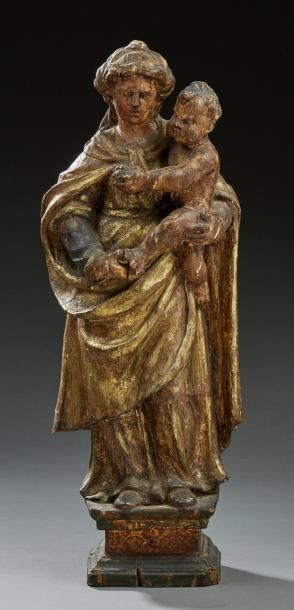null Vierge à l'enfant
Sculpture en bois doré, traces de polychromie.
XVIIIe siècle
H.:...