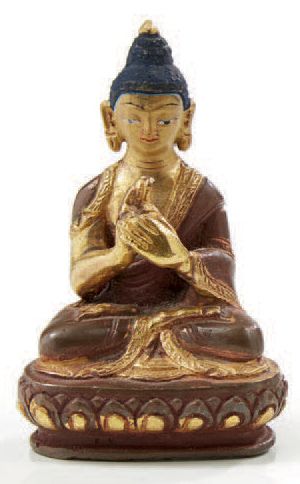 CHINE 
Bouddha en bronze à deux patines.
H.: 8,2 cm