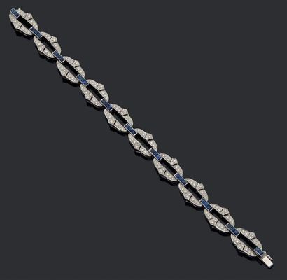 null Bracelet en or gris 18K (750) à maillons ovales sertis de diamants taillés en...