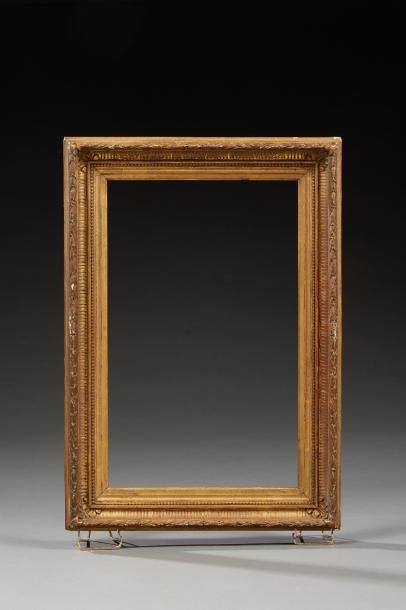 null Cadre en bois doré et sculpté. 
Style et époque Louis XVIe. 
Dim. : 36,2 x 52...