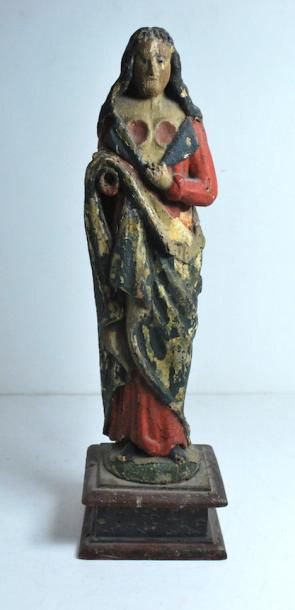 null Sainte Agathe en bois sculpté polychrome.
XVIIIe 
(accident)
H. : 41 cm.