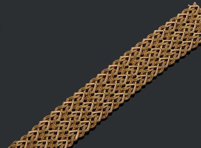 null Large bracelet en or 18K (750).
Poids: 83,33 g