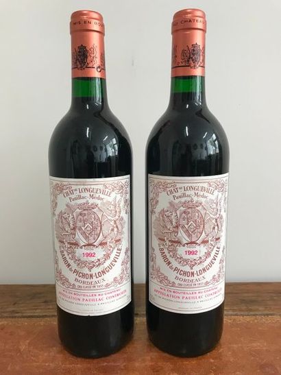 Deux bouteilles de Château Longueville, Baron...