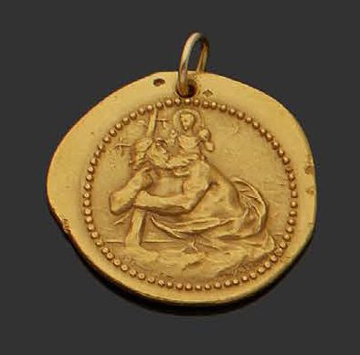 null Médaille en or jaune 18K (750) ciselée d'une scène religieuse.
Diam.: 3,5 cm
Poids...