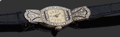 null Montre bracelet de dame à quartz en or gris 18K (750), à boitier tonneau, la...