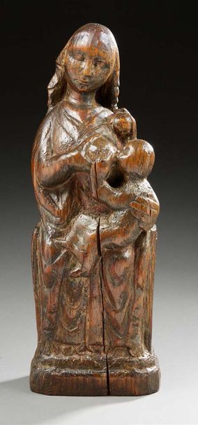 null Vierge
Sculpture de la Vierge Marie allaitant en bois.
Travail ancien.
H.: 47...