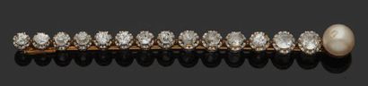null Broche barrette en or jaune 18K (750) sertie de diamants et perle.
Poids brut:...
