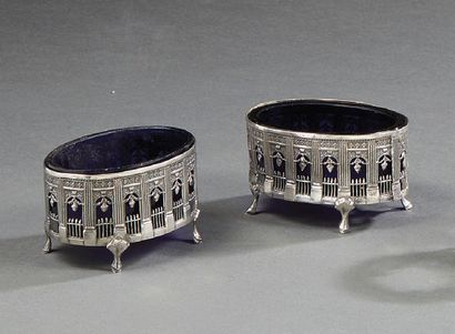 null Pair of oval silver salerons, with openwork gallery, resting on four hoof feet....