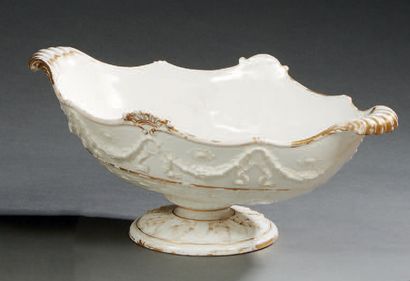 PARIS Oval bowl on porcelain base decorated in light relief with garland felt with...