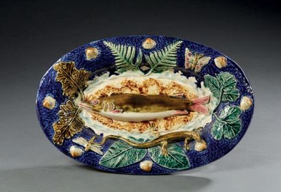 Ecole de Paris Oval earthenware dish decorated in relief with a pike on a flamed...