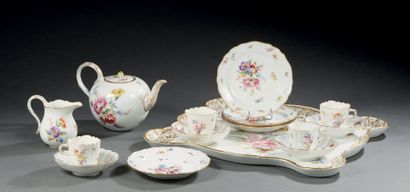 MEISSEN Porcelain tea set with polychrome floral decoration including a tray, a teapot,...