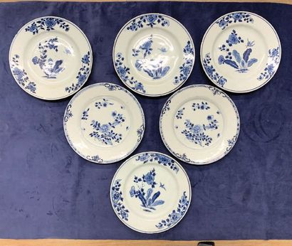 CHINE Set of six porcelain plates decorated in blue underneath covered with different...