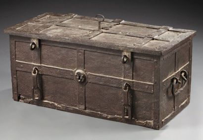 null A rectangular chest called a "privateer's chest" made of iron decorated with...