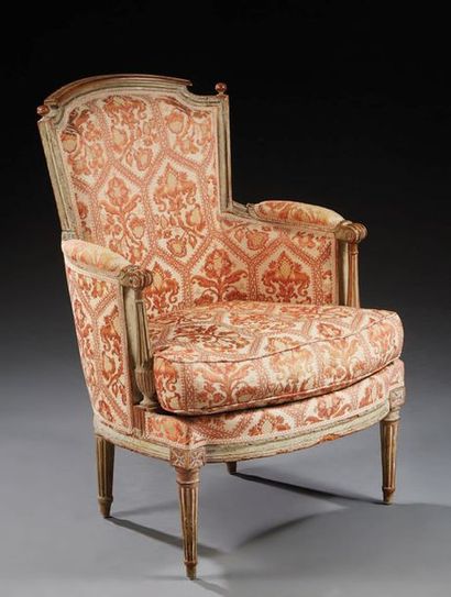 null Bergere with a cabriolet backrest in molded and carved walnut; the backrest...