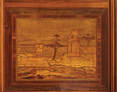 null A chest of drawers inlaid with panels representing landscapes in perspective...