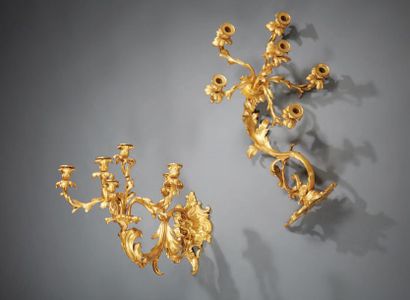 null Pair of large six-light wall lights in chased and gilded bronze; the rockwork...