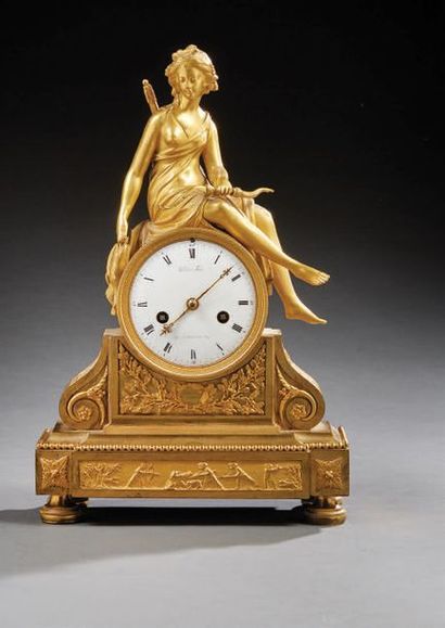 null Chased and gilded bronze clock with the theme of Diana chasseesse, the latter...