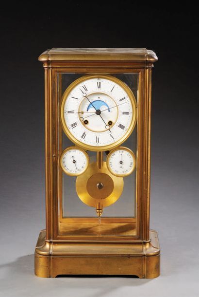 null A so-called molded brass cage clock; it features three dials indicating the...