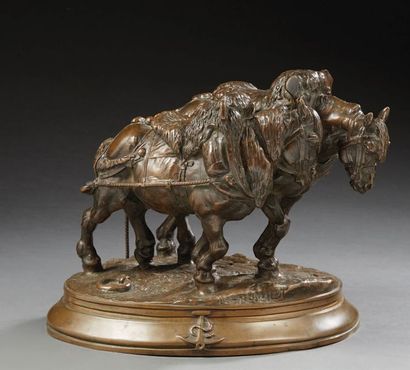Frémiet (d'après) 
Group in chased and patinated bronze representing two towing horses...