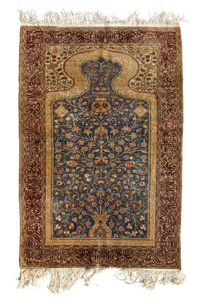 IRAN Tapis à fond bleu.
Fin du XIXe siècle.
Dim.: 111 x 178 cm