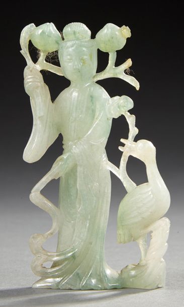 CHINE Petit groupe en jade sculpté d'une guanyin près d'une grue.
XXe siècle.
H....