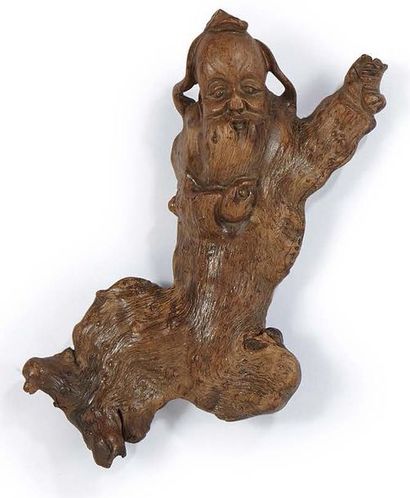 JAPON Figurine en racine sculptée représentant un hermite.
XIXe siècle.
L. : 18 ...
