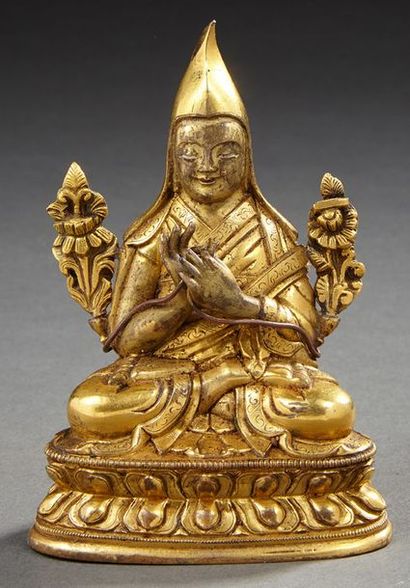ART SINO-TIBETAIN Figurine en bronze doré représentant un lama assis en position...