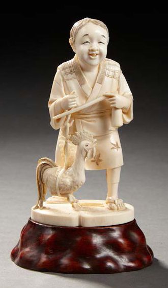 JAPON JAPON
 
Okimono en ivoire sculpté représentant un paysan pesant un coq avec...