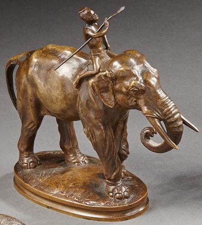 Alfred BARYE d'après (1839-82) Éléphant et son cornac
Sujet en bronze à patine brune.
H.:...
