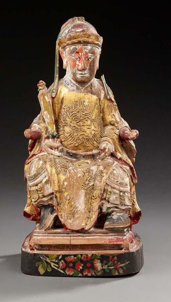 CHINE Figurine en bois sculpté avec traces de laque rouge, de polychromie et d'or...