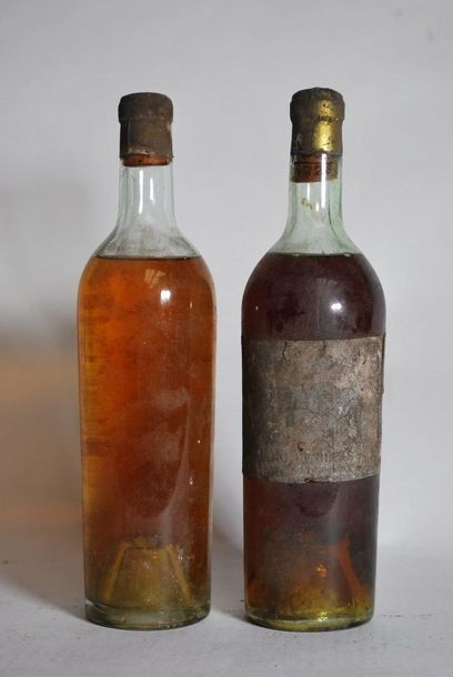 null Ensemble de deux bouteilles de vins licoreux, une marquée 1929 sur le bouch...
