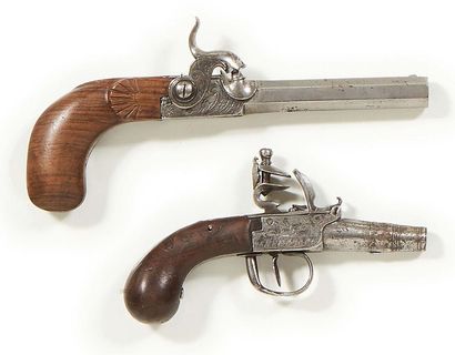 null Ensemble de deux pistolets à coffre.
Epoque XIXe siècle.
Long.: 15 et 20,5 ...