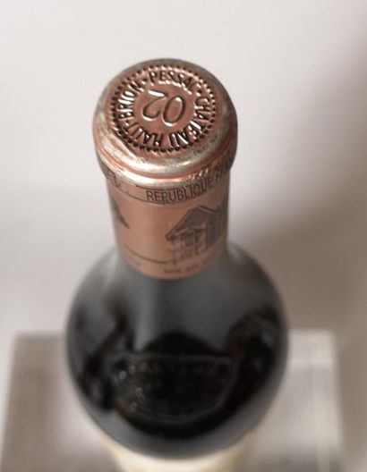 null 1 bouteille CHÂTEAU HAUT BRION - 1er Gcc Pessac Léognan 2002

Etiquette fanée,...