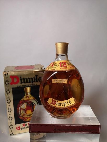 null 1 bouteille WHISKY DIMPLE - 12 ANS nm Bouteille des années 1970


Coffret i...