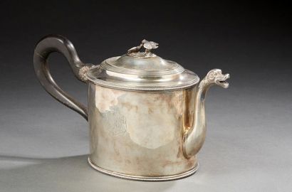 null Teapot with oval section and engraved belly with double coat of arms under crown,...