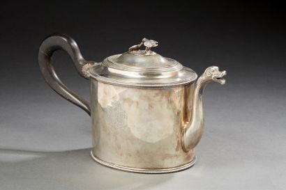 null Teapot with oval section and engraved belly with double coat of arms under crown,...