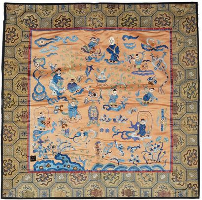 CHINE - Début XXe siècle Three panels in beige and ochre silk embroidered with blue...